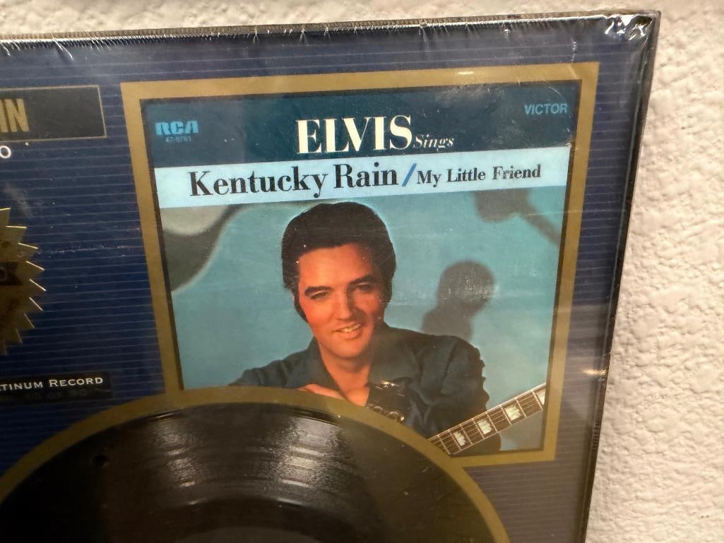 ELVIS COLLECTIBLES ELVIS GREATEST HITS VOL I & II DECANTER, PORCELAIN FIGURINE AND KENTUCKY RAIN 45 - 15