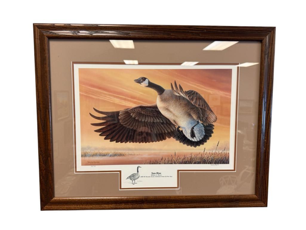 WILLIAM A. MOORE RENO, NV ARTIST DUCKS UNLIMITED PRINT SUN-RISE NO. 39/750: SIGNED LOWER RIGHT, ART AND ARTIST INFO ON THE BACK, FRAMED 28" X 21 1/2" FRAME
