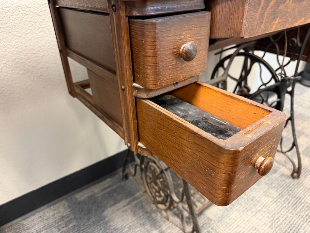 ANTIQUE SINGER TREADLE SEWING MACHINE WITH OAK CABINET AND CAST IRON BASE - 11