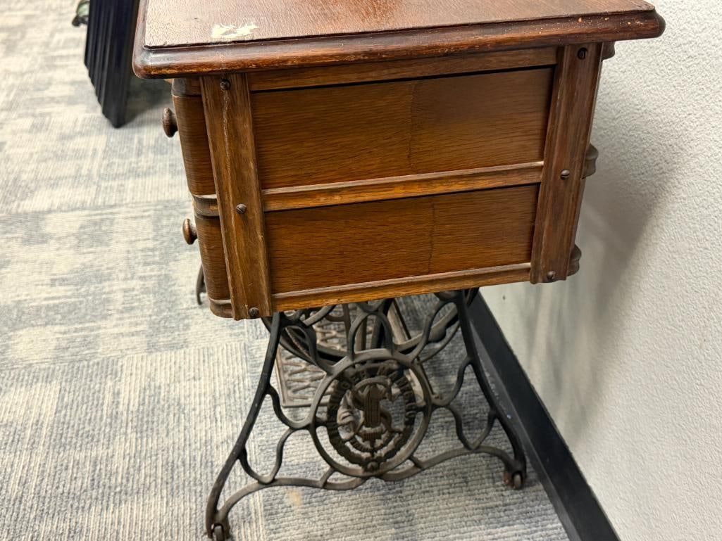 ANTIQUE SINGER TREADLE SEWING MACHINE WITH OAK CABINET AND CAST IRON BASE - 16
