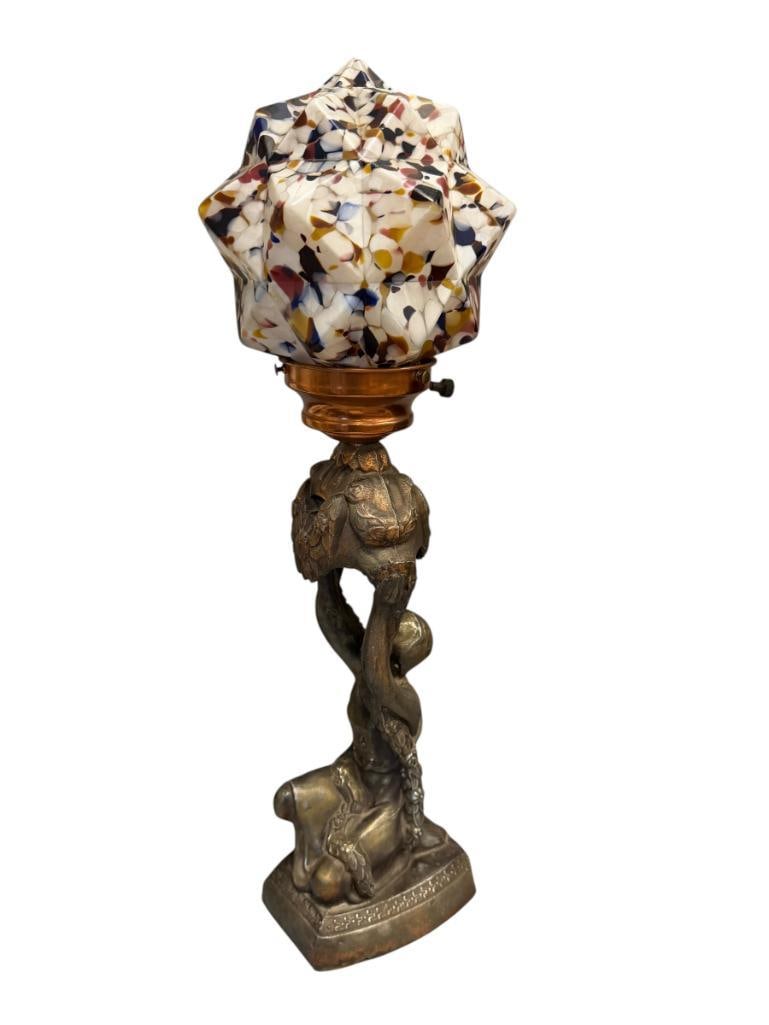 1920'S ART DECO FIGURLA LAMP WITH CZECHOSLOVAKIAN SPATTER GLASS GLOBE: LAMP DEPICTS WOMAN HOLDING UP A LIGHT, WITH MULTICOLOR CZECH MADE ART GLASS GLOBE, WILL NEED TO BE REWIRED 21 1/2" H 