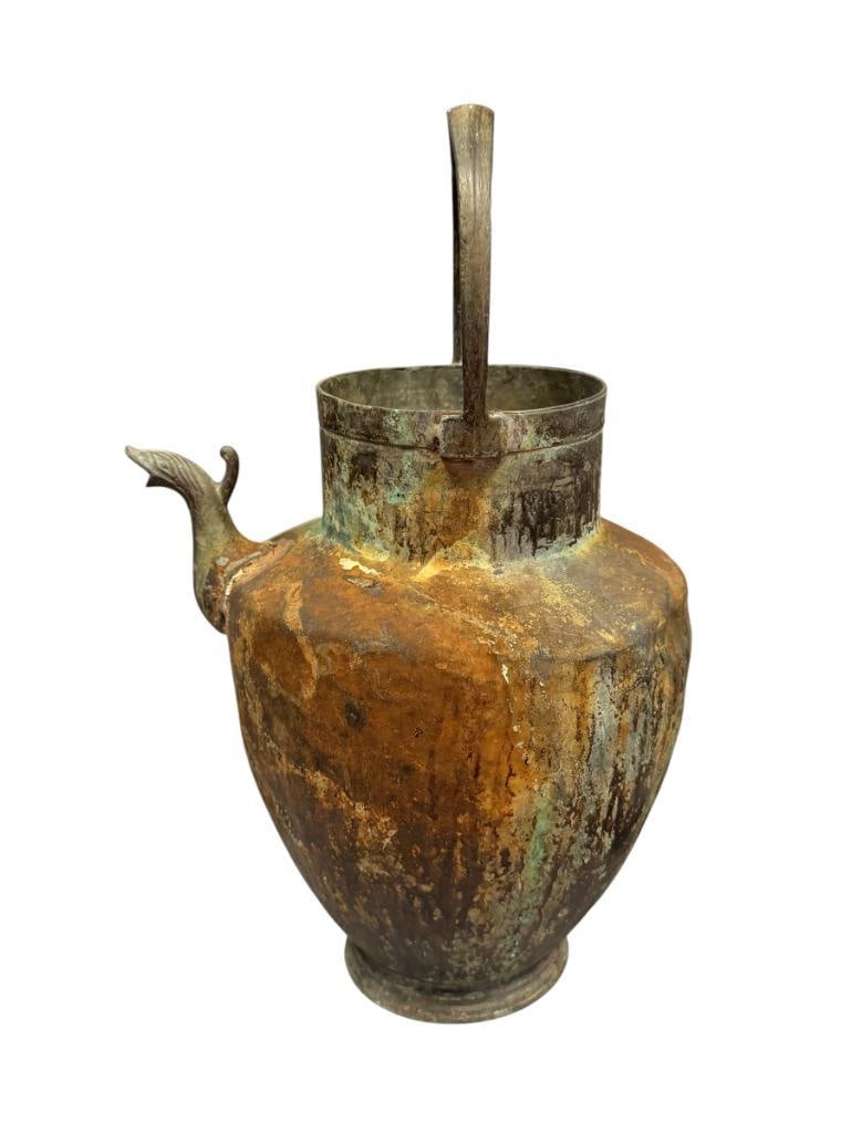 ANTIQEU HANDMADE METAL PITCHER / MEZZINA WATER JUG WITH STYLIZED BIRD SPOUT: LARGE BODY WITH STEPPED ROUND BASE, FIXED HANDLE, DOES SHOW WEAR / AGE 16 1/2" H