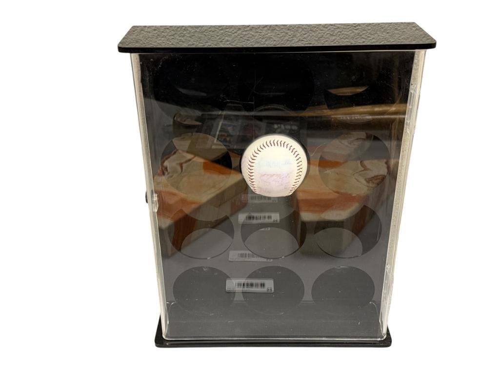 AUTOGRAPHED BASEBALL BY TOMMY DAVIS, CURT FLOOD, VITA BLUE, ETC.: BALL FEATURES 13 SIGNATURES, SIGNATURES ARE HEAVILY FADED, BUT MANY ARE STILL LEGIBLE, INCLUDES 12-BALL BASEBALL ACRYLIC DISPLAY, FROM THE ESTATE OF A LOCAL RENO, NV DOCTOR AT RENOWN WHO RAN BIG