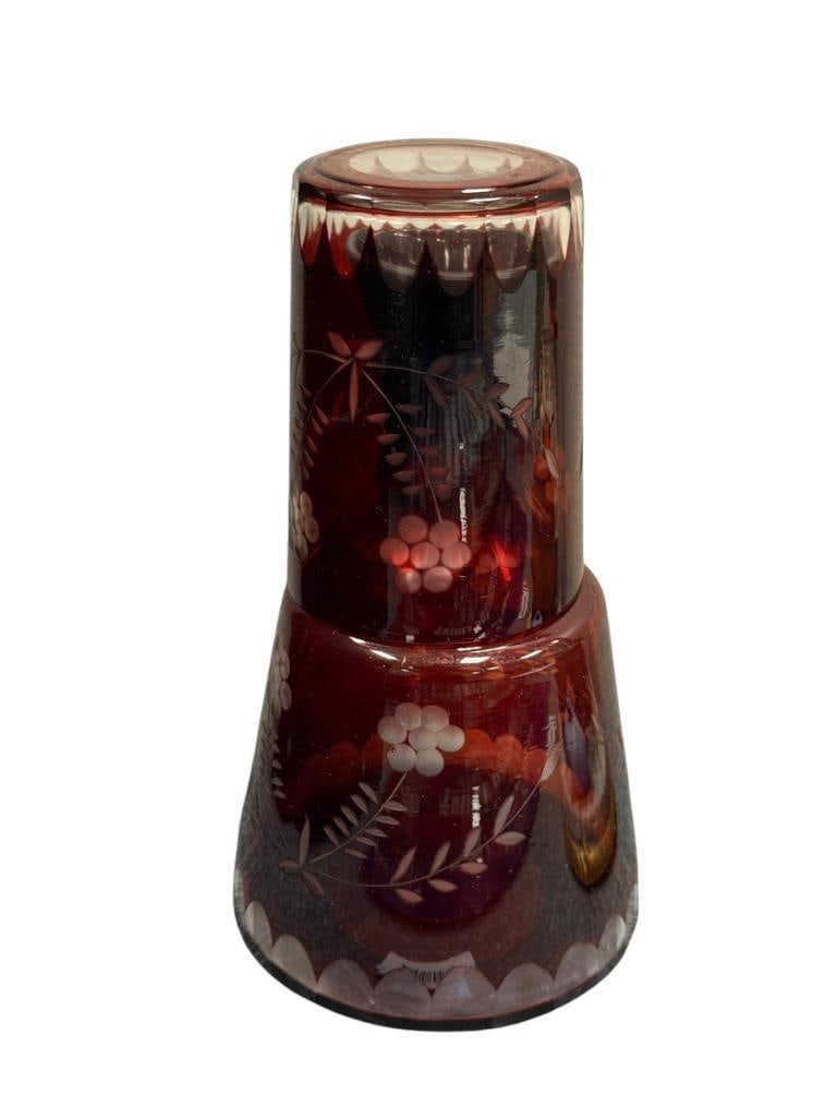 VINTAGE BOHEMIA RUBY RED CUT TO CLEAR GLASS TUMBLE UP BED SIDE WATER DECANTER AND GLASS: MATCHING SET, FLORAL ETCHED DESIGN, NO CHIPS OR CRACKS 4 1/4" GLASS, 7 3/4" DECANTER