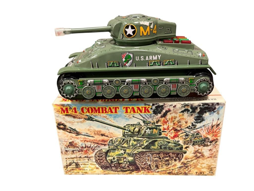 TAIYO JAPAN TIN-LITHO BATTERY OPERATED M4 COMABT TANK TOY CIRCA 1970'S - 1980'S: FEATURES MOTORIZED ACTION, MACHINE GUN SOUNDS, LIKE-NEW WITH ORIGINAL BOX 11 1/4" L
