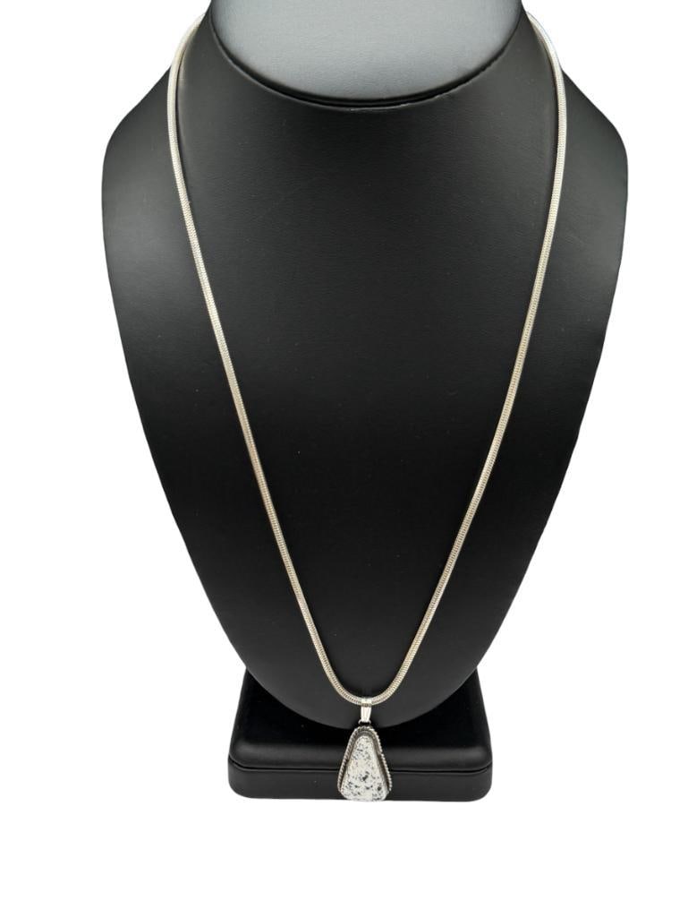 NAVAJO STERLING SILVER WHITE BUFFALO PENDANT NECKLACE: FEATURING WHITE BUFFALO PENDANT ON STERLING SILVER SNAKE CHAIN NECKLACE 24" NECKLACE, 1 1/14" PENDANT, 14.05 GRAMS TOTAL