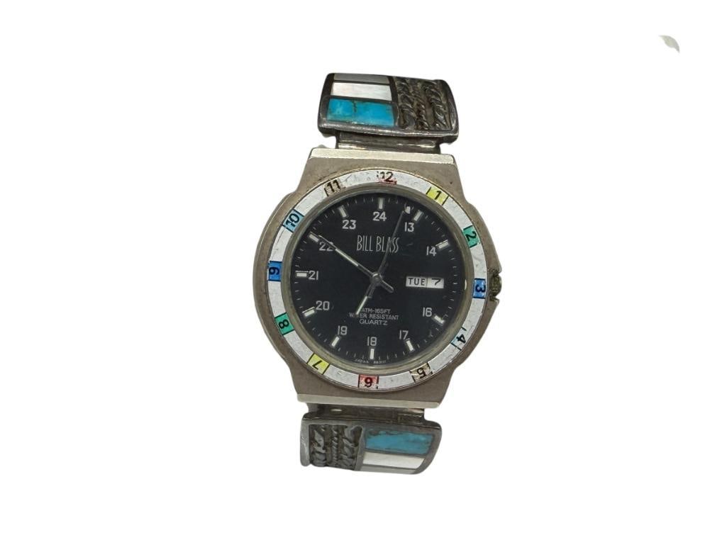 VINTAGE NATIVE AMERICAN STERLING SILVER INLAID TURQUOISE AND MOTHER OF PEARL WATCH TIPS BILL BLASS: TIPS ARE MOUNTED TO BILL BLASS 165FT WATER RESISTANT WATCH FEATURING DATE AND DAY ADJUST, QUARTZ MOVEMENT, NOT CURRENTLY RUNNING, MOST LIKELY JUST NEEDS NEW BATTER, WORN CONDITION, STAINLESS STEEL BAN