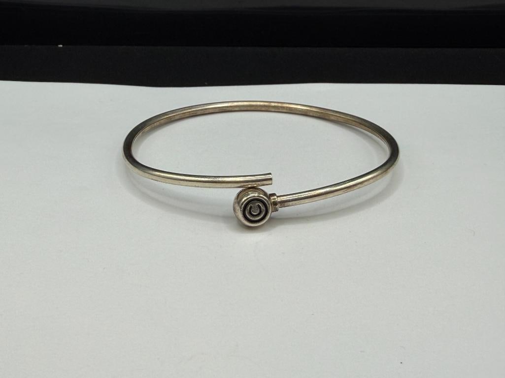 STERLING SILVER BYPASS BANGLE BRACELET WITH COPYRIGHT "C" DESIGN - 2