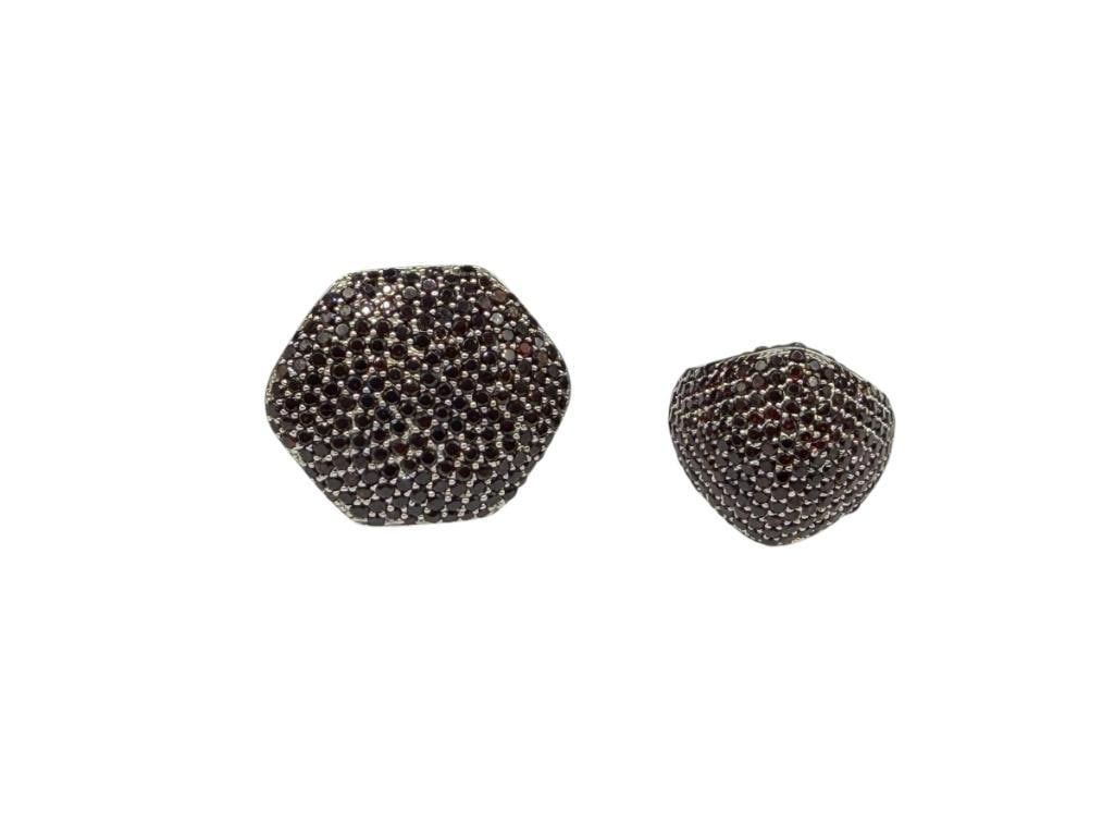 TWO STERLING SILVER GARNET CLUSTER FASHION RINGS: BOTH FEATURE UNIQUE SHAPES AND ARE PAVED WITH ROUND CUT GARNETS SIZE 6 3/4, UP TO 1 1/8" FRONTS, 29.46 GRAMS