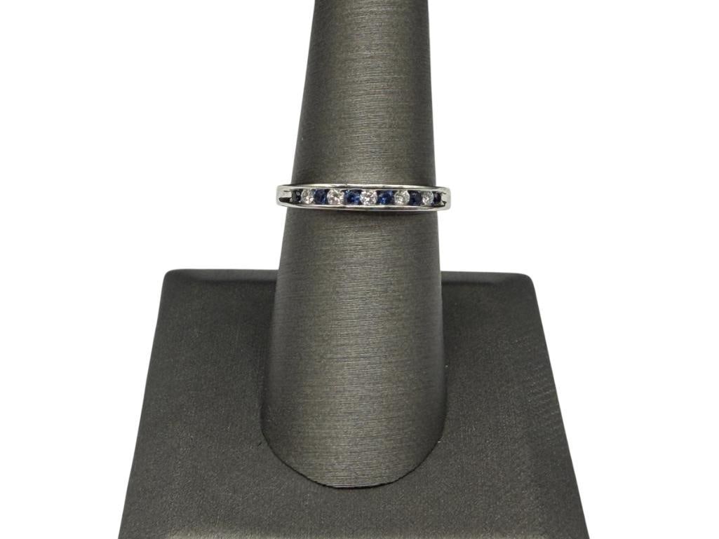 STERLING SILVER BLUE MOISSANITE AND WHITE MOISSANITE BAND: FEATURING ALTERNATING ROUND BRILLIANT CUT MOISSANITES IN BLUE AND WHITE SIZE 7, 1.5MM MOISSANITES, 2.00 GRAMS