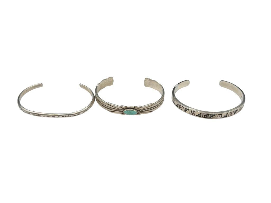 THREE STERLING SILVER NATIVE AMERICAN CUFF BRACELETS INCLUDING ONE WITH TURQUOISE (1 of 7)