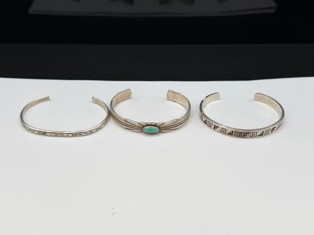 THREE STERLING SILVER NATIVE AMERICAN CUFF BRACELETS INCLUDING ONE WITH TURQUOISE - 2