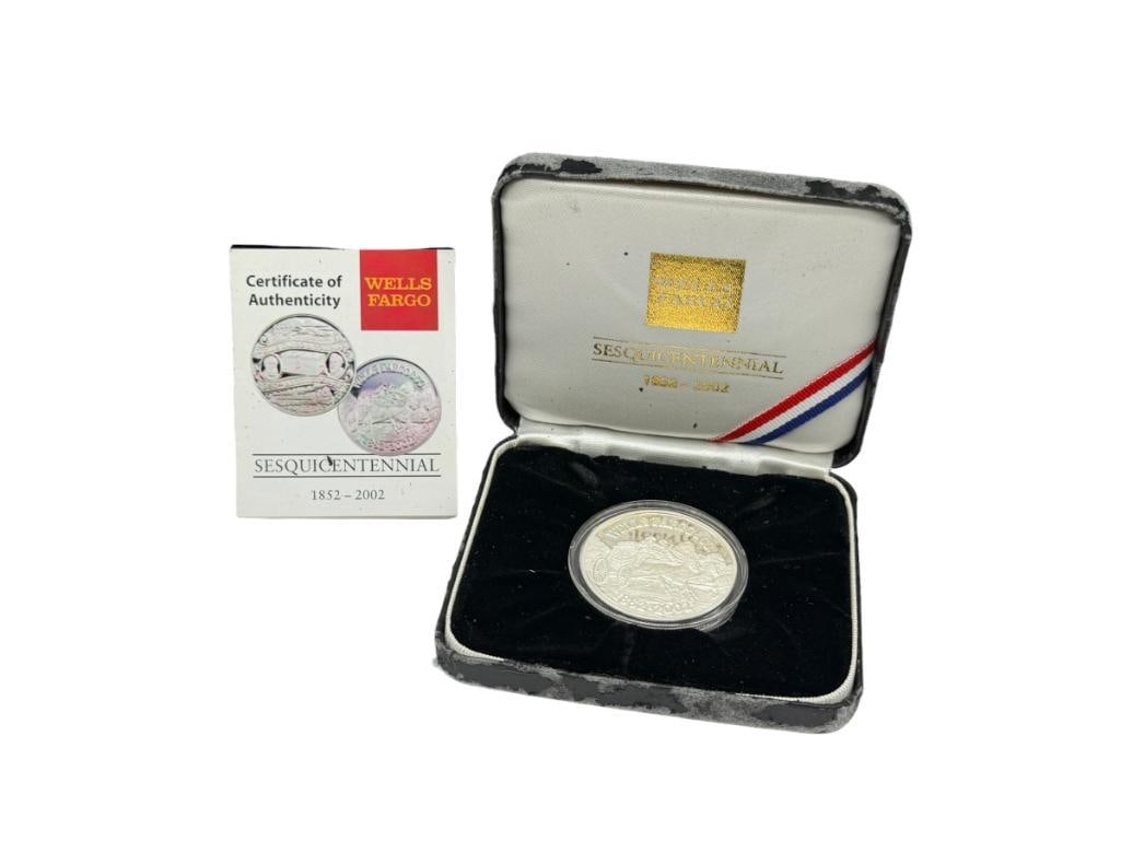 WELLS FARGO 150TH ANNIVERSARY .999 FINE SILVER COIN FEATURING STAGECOACH IN RELIEF: EXCEPTIONAL DETAIL, SESQUICENTENNIAL, 1852 - 2002, INCLUDES ORIGINAL CASE AND CERTIFICATE OF AUTHENTICITY 1 TROY OUNCE