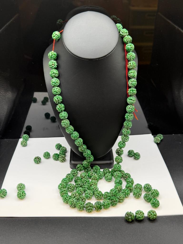109 CARVED GREEN SPINACH JADEITE BEADS INCLUDING MOST STRUNG ON RED THREAD - 2
