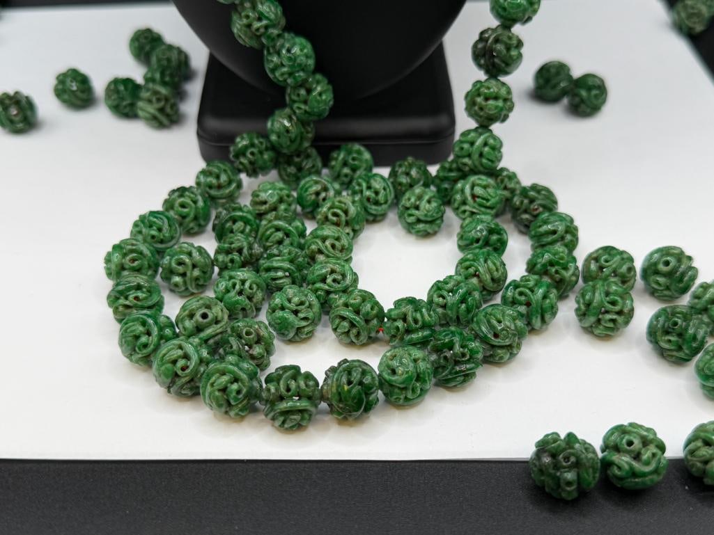 109 CARVED GREEN SPINACH JADEITE BEADS INCLUDING MOST STRUNG ON RED THREAD - 3