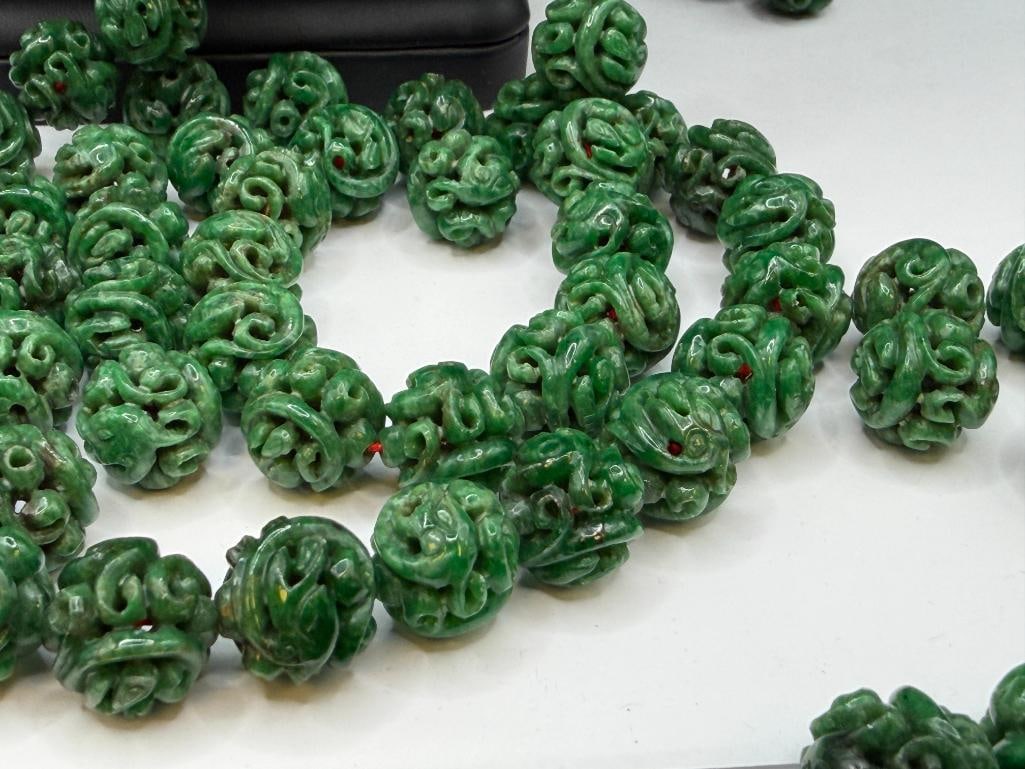 109 CARVED GREEN SPINACH JADEITE BEADS INCLUDING MOST STRUNG ON RED THREAD - 4