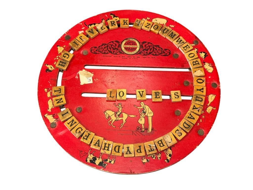 ANTIQUE 1912 CRESS EDUCATIONAL BOARDS DUAL SIDED SPELLING AND MATH BOARD: FEATURES SPELLING BOARD ON ONE SIDE AND ON THE OTHER MATH SIDE, WITH ILLUSTRATIONS, SHOWS LITTLE WEAR FROM AGE AND USE 11" ROUND