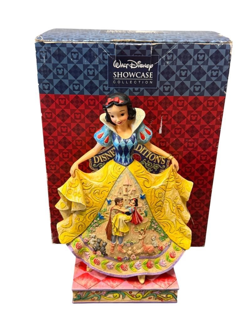 WALT DISNEY SHOWCASE COLLECTION BY ENESCO SNOW WHITE FIGURINE FAIRY TALE ENDINGS NO. 4007992: TITLED FAIR TALE ENDINGS FOR THE FAIREST OF THEM ALL, WHIMSICAL FIGURINE OF SNOW WHITE WITH IMAGE IN RELIEF OF HER AND PRINCE, INCLUDES ORIGINAL BOX, NO DAMAGE OR REPAIRS 9 1/2" H