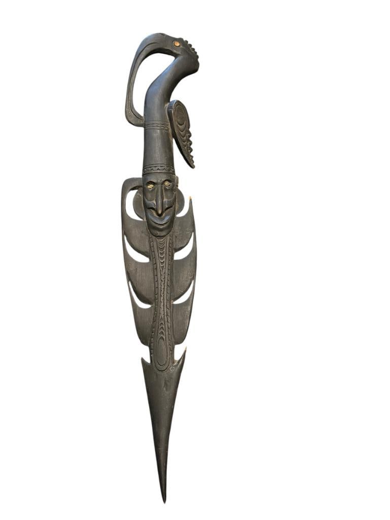 TRADITIONAL WOOD CARVING FROM PAPUA NEW GUINEA FIGURAL SUSPENSION HOOK: HAND CARVED FIGURAL SUSPENSION HOOK WITH BIRD STYLIZED HANDLE, POSSIBLY FROM SEPIK RIVER REGION, SHOWS DAMAGE NEAR FIGURAL HEAD 25 1/4" L