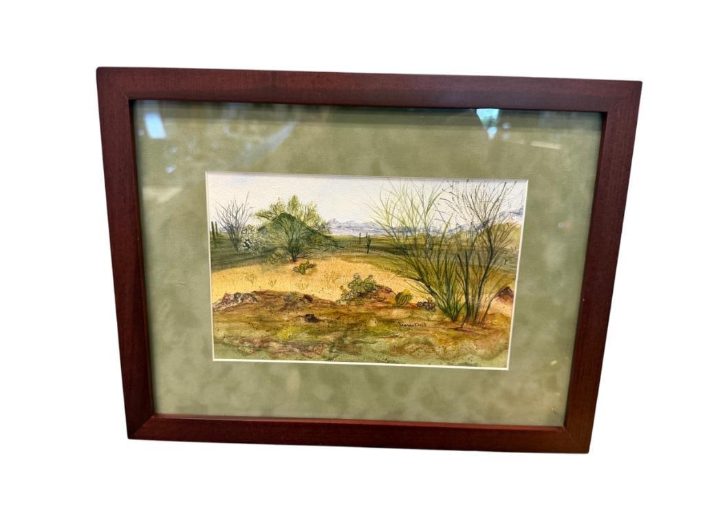 SIGNED ORIGINAL WATERCOLOR ON PAPER DESERT LANDSCAPE DATED 2013: ART DEPICTS DESERT VEGETATION WITH MOUNTAINS IN THE BACKGROUND, SIGNED LOWER RIGHT, FRAMED 13 1/4" X 10 1/4" FRAME