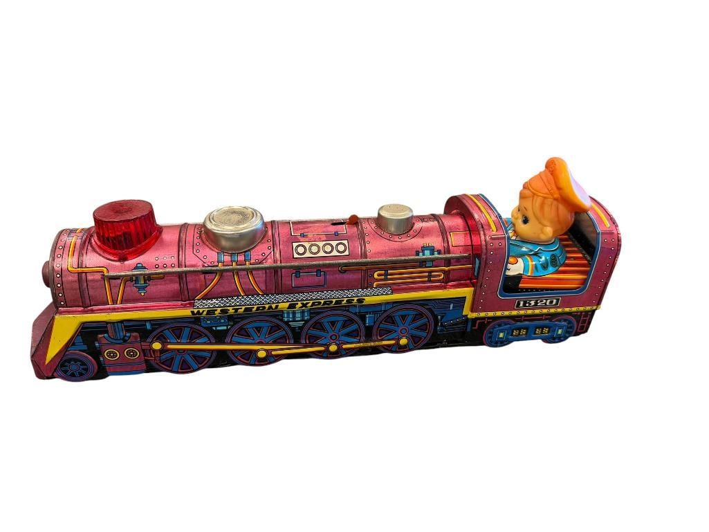 1970'S KANTO TOYS WESTERN EXPRESS TIN LITHO TOY TRAIN MADE IN JAPAN: BATTERY POWERED WITH MYSTERY ACTION, LIGHT, AND SOUND, SHOWS LIGHT SIGNS OF WEAR 13 1/2" L