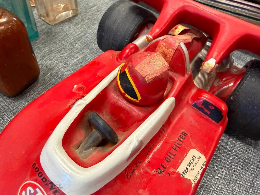 TWO VINTAGE FIGURAL FORMULA 1 WINNING CAR WHISKEY DECANTERS INCLUDING #20 STP INDY 500 G. JOHNCOCK - 11
