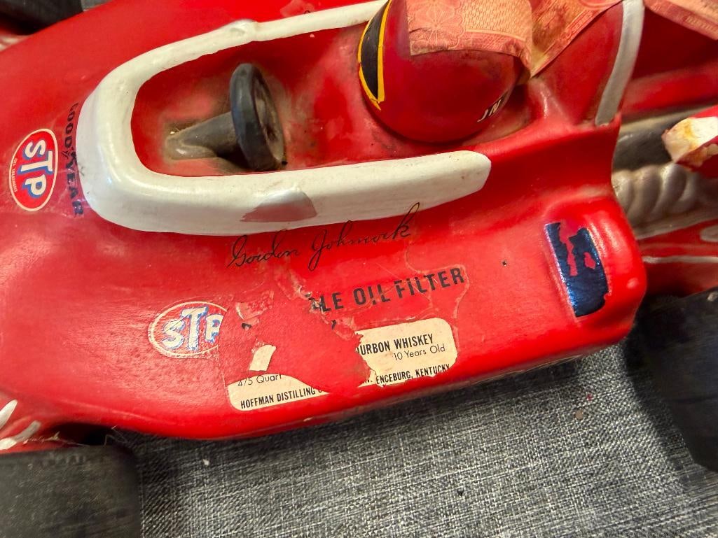 TWO VINTAGE FIGURAL FORMULA 1 WINNING CAR WHISKEY DECANTERS INCLUDING #20 STP INDY 500 G. JOHNCOCK - 13