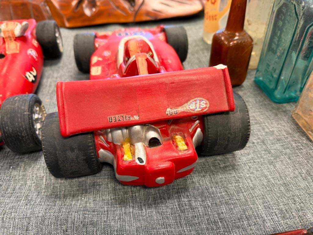 TWO VINTAGE FIGURAL FORMULA 1 WINNING CAR WHISKEY DECANTERS INCLUDING #20 STP INDY 500 G. JOHNCOCK - 14