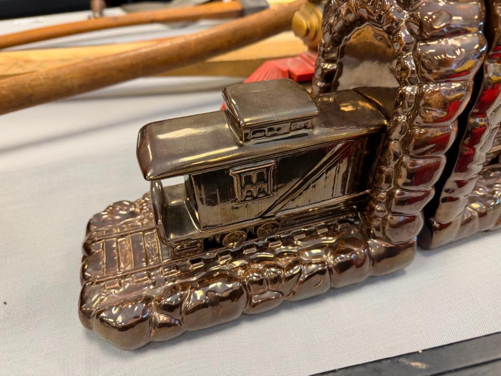 ASSORTED TRAIN COLLECTIBLES INCLUDING CERAMIC BOOKENDS, CARVED WOOD MODEL TRAINS, AND MORE - 13