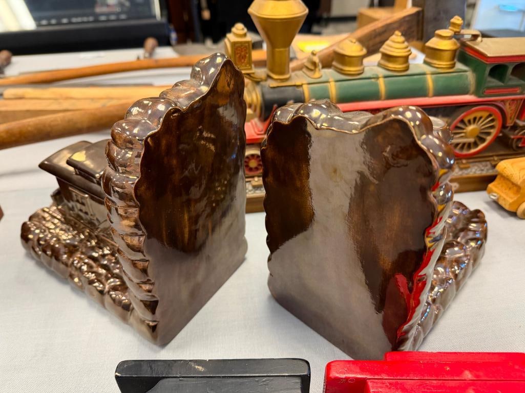 ASSORTED TRAIN COLLECTIBLES INCLUDING CERAMIC BOOKENDS, CARVED WOOD MODEL TRAINS, AND MORE - 14