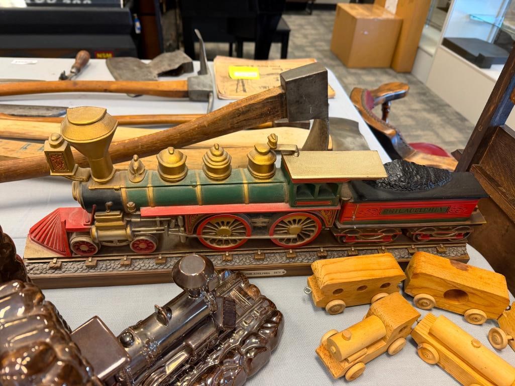 ASSORTED TRAIN COLLECTIBLES INCLUDING CERAMIC BOOKENDS, CARVED WOOD MODEL TRAINS, AND MORE - 15