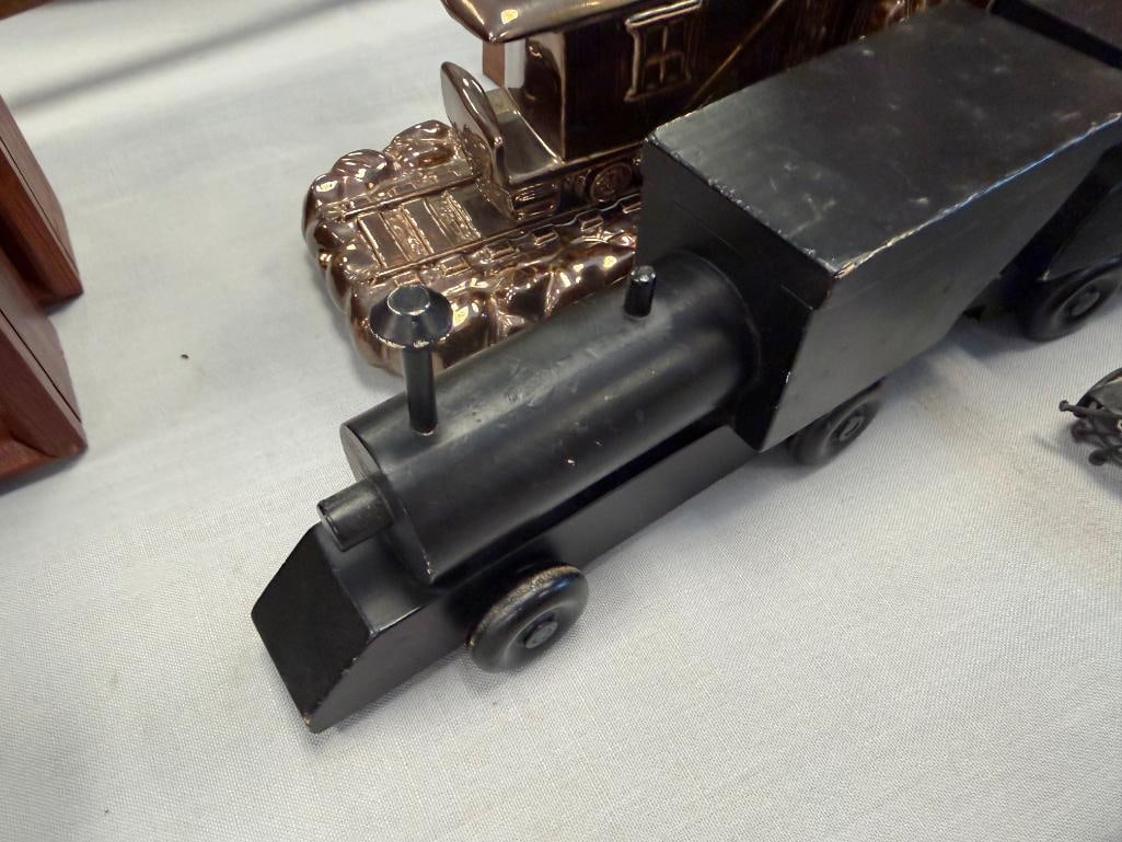 ASSORTED TRAIN COLLECTIBLES INCLUDING CERAMIC BOOKENDS, CARVED WOOD MODEL TRAINS, AND MORE - 9