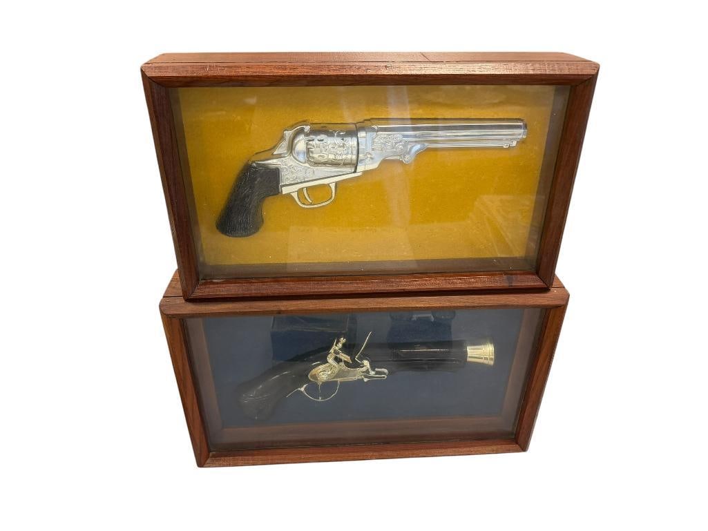 TWO FRAMED AVON DECANTERS INCLUDING COLT REVOLVER AND BLUNDERBUST FLINTLOCK PISTOL: BOTH IN SHADOWBOX WOOD AND GLASS FRAMES FRAMES ARE 14" X 8 1/2"