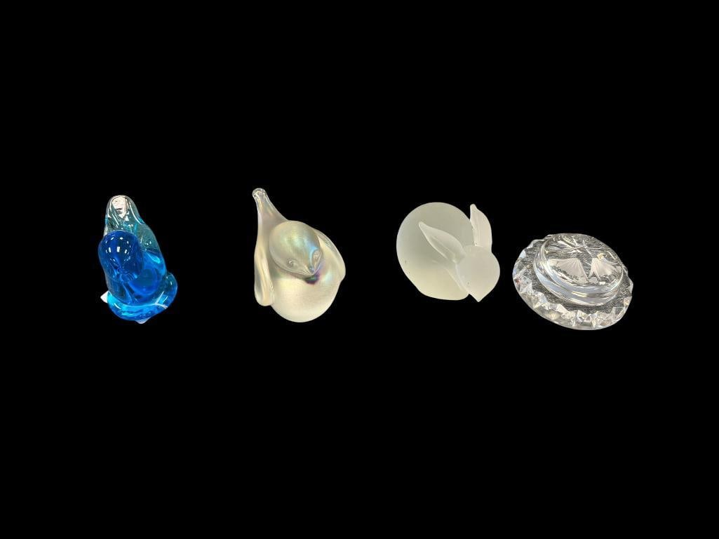 FOUR COLLECTIBLE GLASS PAPERWEIGHTS INCLUDING ZALIQUE DOVE, RABBIT, LEO WARD SIGNED BLUE GLASS BIRD: ALSO INCLUDES ROYAL BRIERLEY CUT GLASS FLORAL MOTIF PAPERWEIGHT, ONLY RABBIT IS NOT SIGNED, NO CHIPS OR CRACKS LARGEST IS 3" H