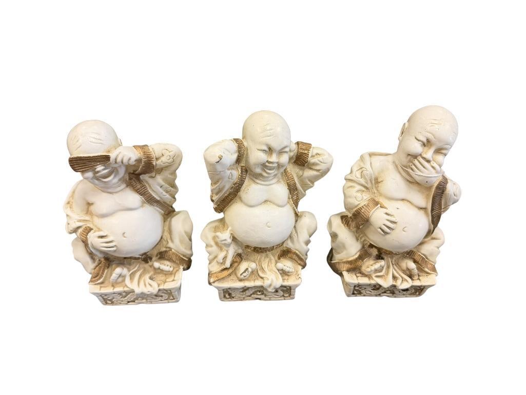 THREE RESIN ASIAN BUDDHAS HEAR NO EVEIL, SPEAK NO EVIL, SEE NO EVIL: WHITE AND GOLD PAINTED DESIGN, SOME MINOR CHIPS 6 1/2" H