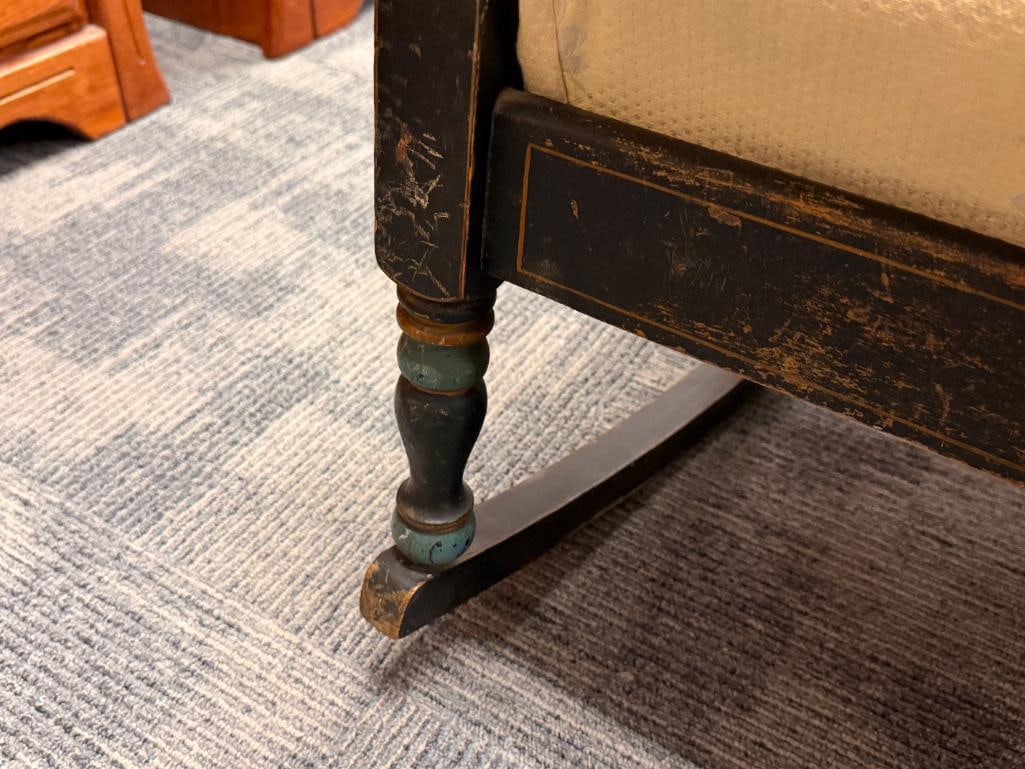 ANTIQUE WOOD ROCKING CHAIR WITH PAINTED BLACK FINISH AND BEIGE SHELL PATTERN UPHOLSTERED SEAT - 7