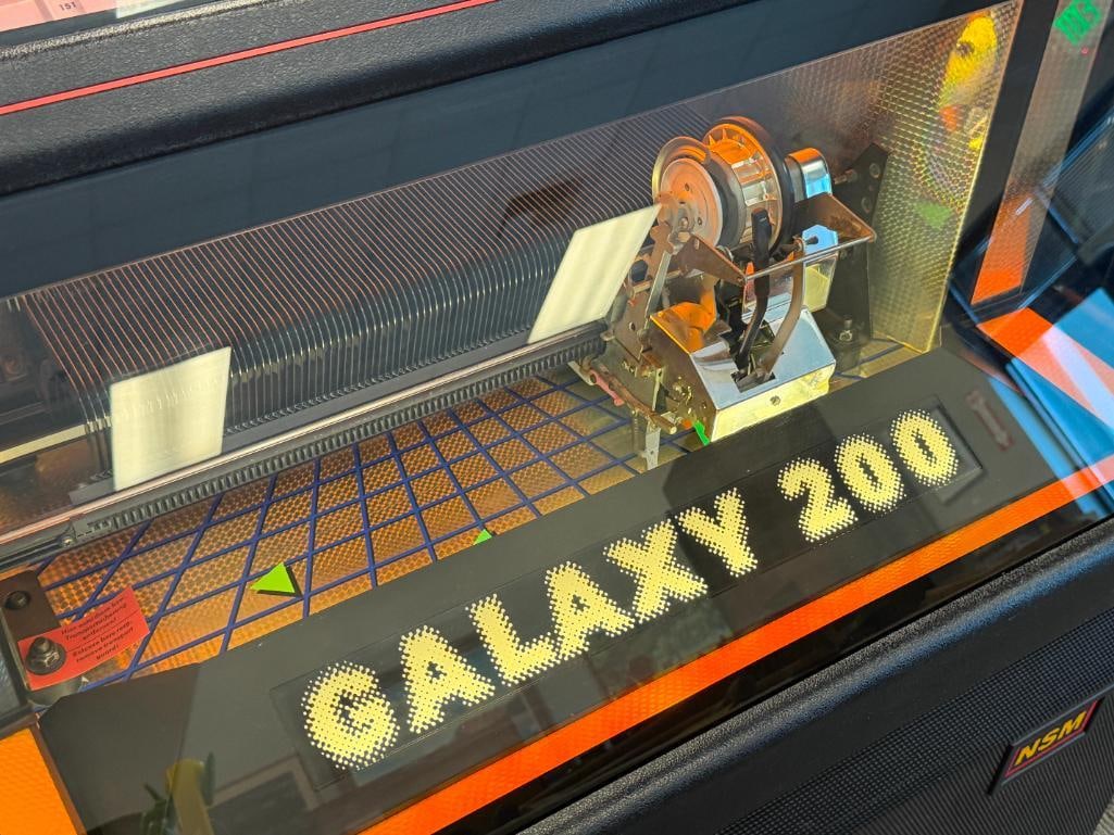 CIRCA 1980'S NSM GALAXY 200 COIN-OPERATED JUKE BOX DESIGNED TO HOLD 100 CDS NO. 35200714 - 5