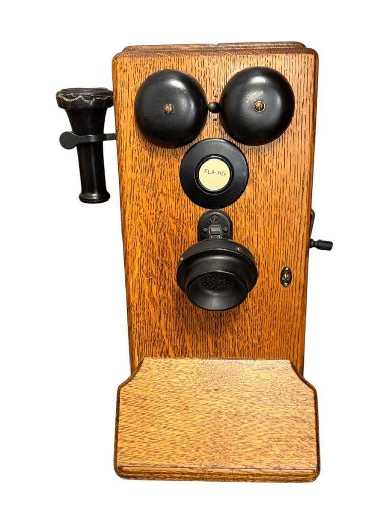 ANTIQUE WESTERN ELECTRIC WALL CRANK TELEPHONE QUARTER SAWN OAK CASE: ALL COMPONENTS PRESENT, MOUTH PIECE HAS BEEN PREVIOUSLY REPAIRED 9" X 6" X 21"