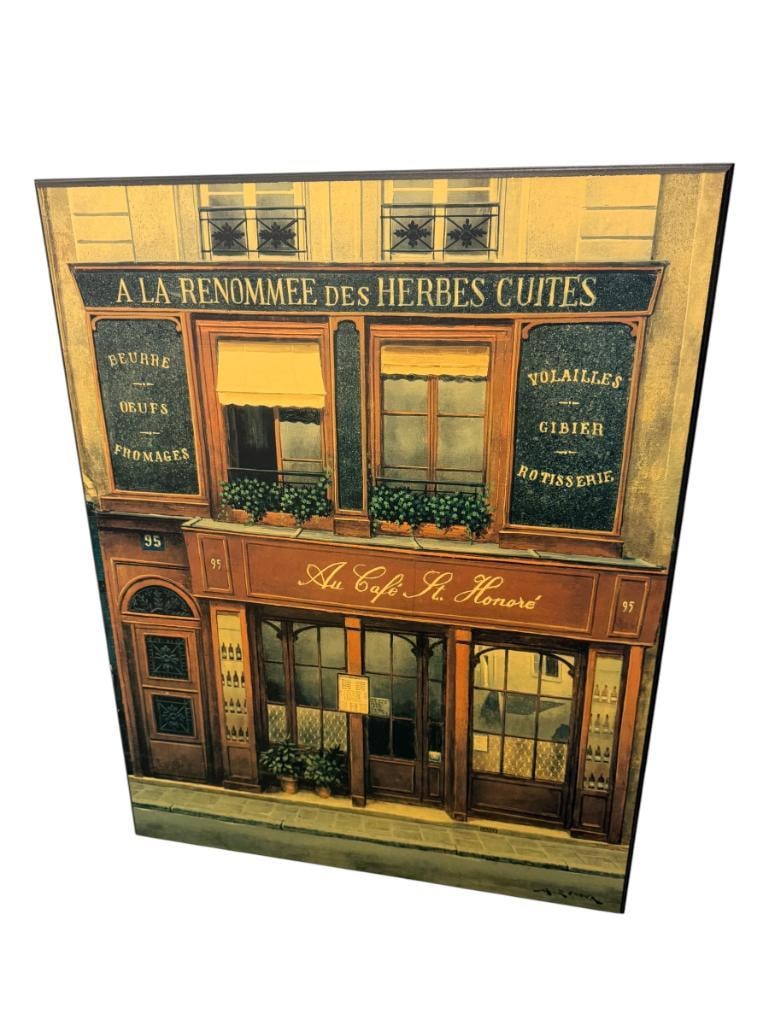 ANDRE RENOUX FRENCH ARTIST PRINT ON BOARD AU CAFE ST. HONORE: ANDRE RENOUX (1939-2002) KNOWN AS THE FATHER OF THE PARIS SCHOOL OF URBAN REALISM, ART DEPICTS PARISIAN STREET SCENE OF CAFE STORE FRONT, PLATE SIGNED LOWER RIGHT 21 1/2" X 27 1/2"