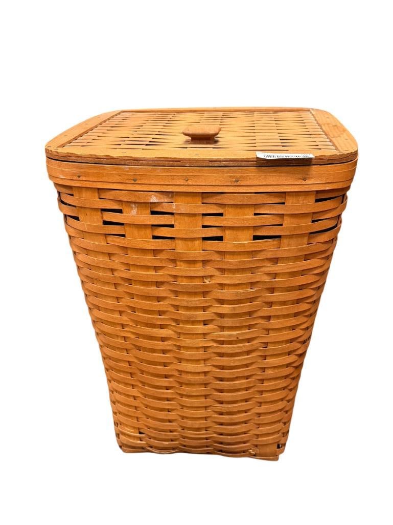 VINTAGE LONGABERGER MAPLE WOVEN LAUNDRY BASKET: HINGED TOP WITH PLASTIC LINER, DOES SHOW SOME WEAR 17" X 17" X 22"