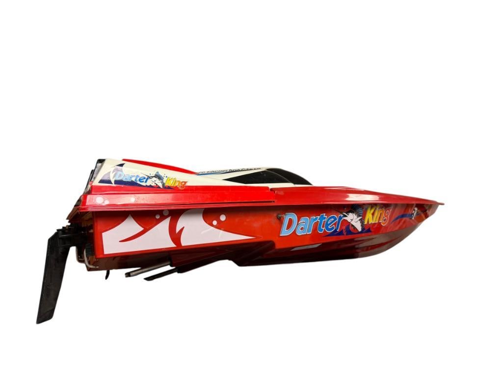 DARTER KING RC READY TO RUN SPEEDBOAT: BATTERY POWERED, THREE PROPELLER DESIGN, UNKNOWN RUNNING CONDITION BUT APPEARS TO BE IN GOOD CONDITION, INCLUDES BATTERY BUT NO REMOTE, 757 R/C RACING BOAT TEAM INSIGNIAS, NO. 757T-6034, FIBERGLASS