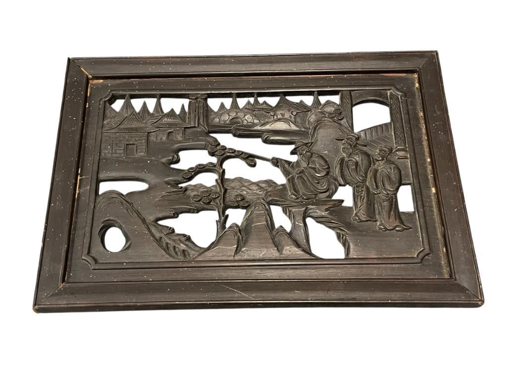 VINTAGE CHINESE EBONIZED CARVED WOOD RELIEF PANEL: PANEL DEPICTS LANDSCAPE SCENE WITH BUILDINGS IN THE BACKGROUND AND SCHOLARS AND ELDER CONVERSING, EBONIZED HARDWOOD, DOES SHOW SOME AGE 20" X 14"
