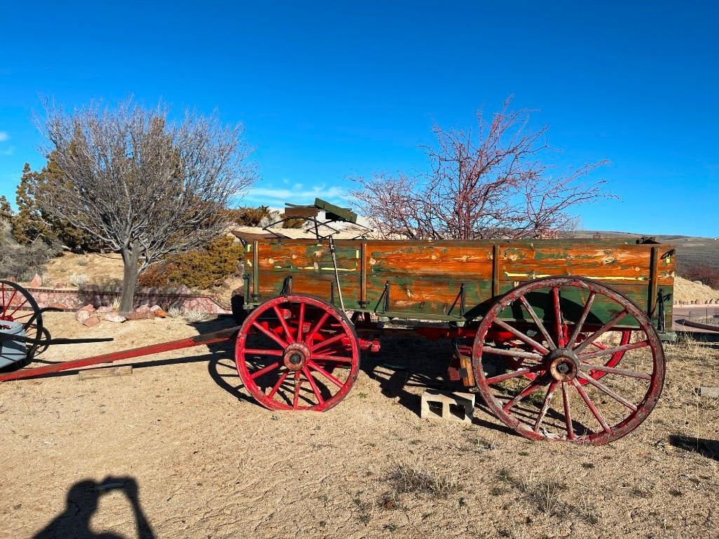 ANTIQUE FARMING / AGRICULTURE WAGON EARLY 20TH CENTURY: WOOD BOX WITH WOODEN WHEELS, COMPLETE, PAINT IS WEATHERED 12' IN LENGTH, 5' WIDE, 39" AND 47" WHEELS 