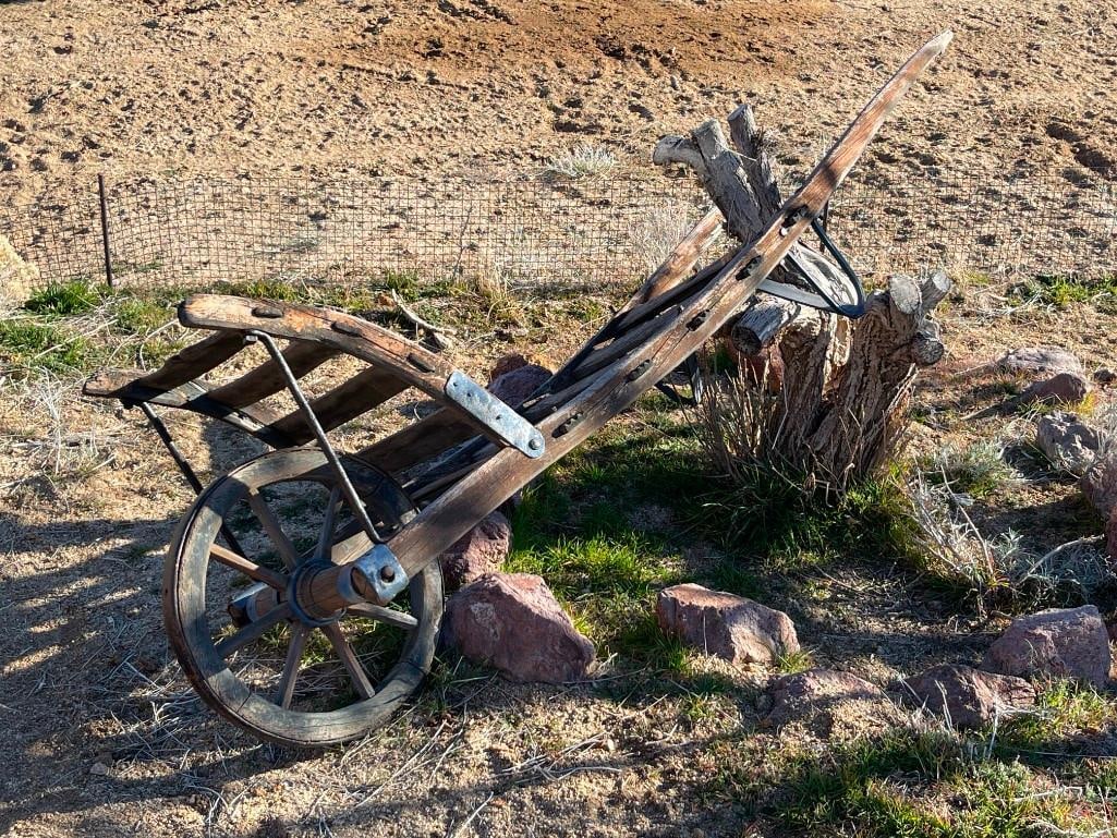 ANTIQUE WOOD AND IRON WHEEL BARROW / MATERIAL HANDLER: USED IN THE LATE 1800'S FOR VARIOUS MATERIAL, SHOWS WEATHERING 76" L"