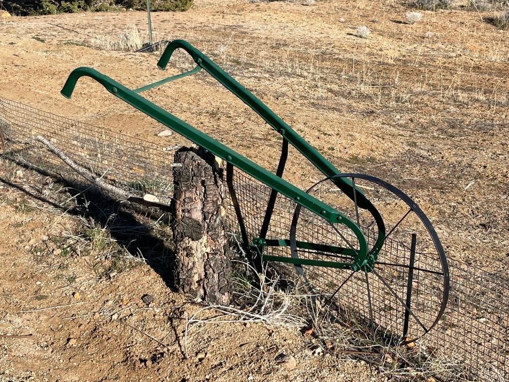 EARLY 20TH CENTURY PUSH BEHIND WALKING HAND PLOW: SINGLE WHEEL WITH BLADE 57" LENGTH