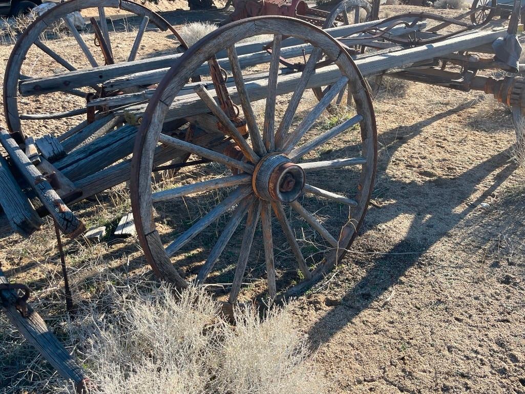 ANTIQUE 19TH CENTURY HORSE DRAWN WAGON FRAME WITH FOUR WAGON WHEELS STILL INTACT - 12