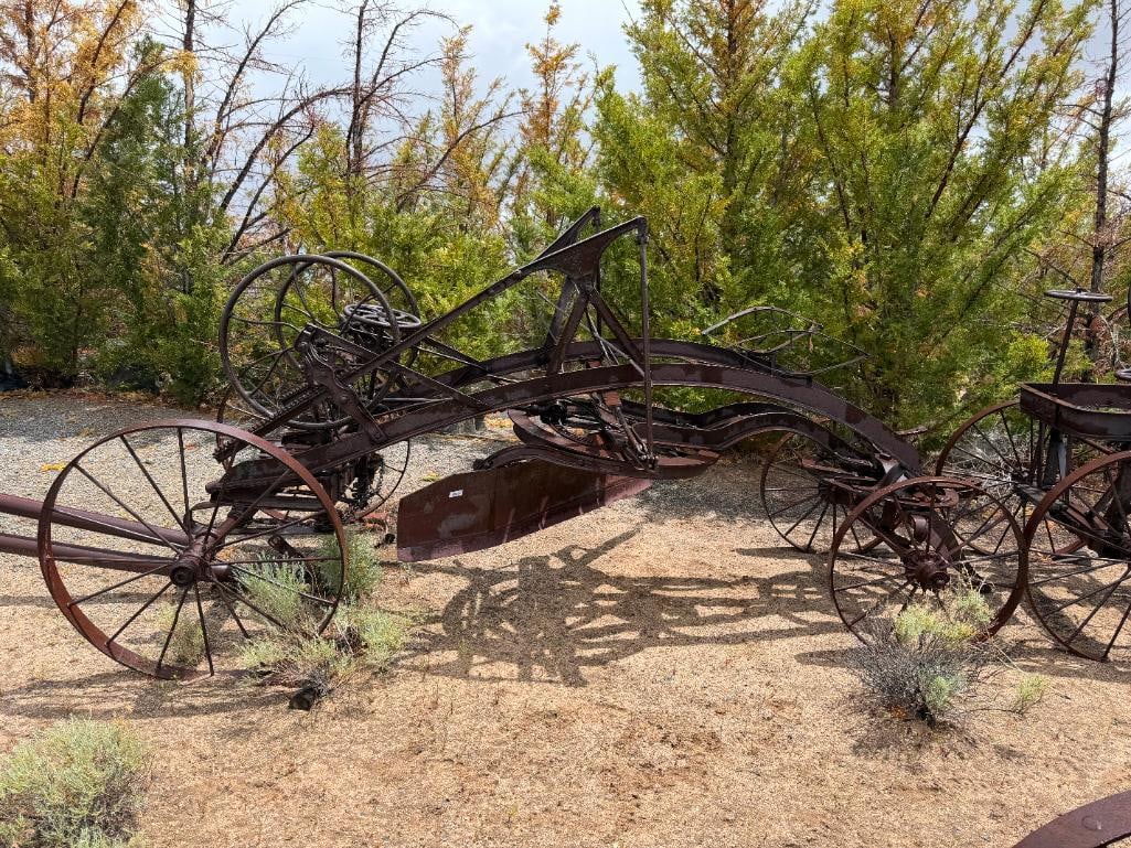 ANTIQUE 1880'S HORSE DRAWN ROAD GRADER BY AUSTIN MFG. CO. HARVEY, ILLINOIS: FEATURING MAKER'S INSIGNIA IN PRESSED STEEL, CIRCA LATE 1880'S, THIS GRADER WAS SIGNIFICANT TECHNOLOGICAL ADVANCEMENT OF IT'S ERA MAKING ROAD LEVELING MUCH MORE EFFICIENT, RUSTED FROM WEATHER, YARD