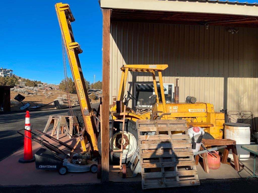VINTAGE WHITE MOTOR CORPORATION 2-63-FL FORKLIFT: HEAVY DUTY ROUGH TERRAIN INDUSTRIAL FORKLIFT, NEEDS SERVICING, NOT CURRENTLY RUNNING, 3.8L 6 CYL ENGINE, 6,000LB LIFT LIMIT, INCLUDES KEY