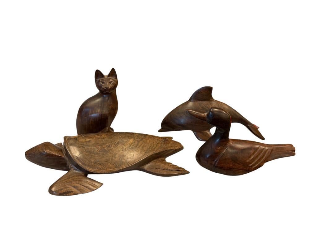 CARVED IRON WOOD WILDLIFE / ANIMAL FIGURIES, TURTLE, DOLPHIN, CAT, AND DUCK: FOUR CARVED ANIMAL FIGURES, CAT HAS PERSONAL WRITING ON THE BOTTOM, TURTLE HAS A DAMAGED FOOT 7" H UP TO 13" L