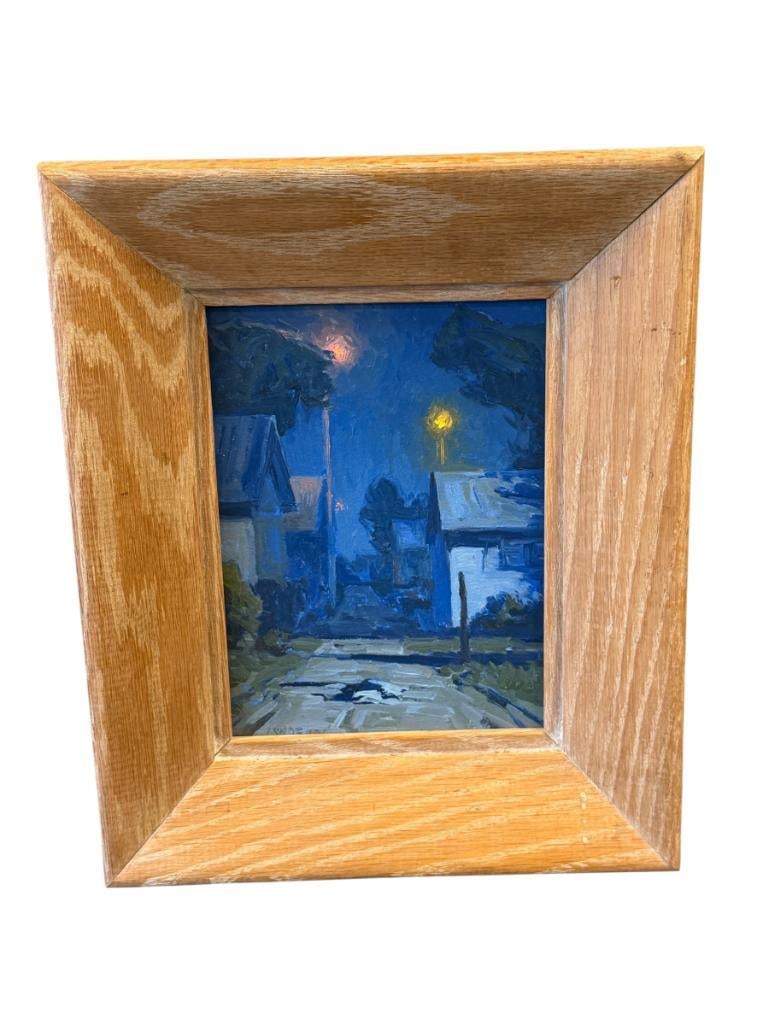 TAYLOR J. LYNDE MONTANA ARTIST ORIGINAL OIL ON BOARD PAINTING HUMBLE REGARDS TO THE MEN ABOVE ME: TAYLOR LYNDE (B. 1970) IS A FOURTH GENERATION MONTANA RESIDENT, ART DEPICTS A BLUE TONED MOODY STREET SCENE, SIGNED LOWER LEFT, ALSO SIGNED ON THE BACK, FRAMED 9 3/4" X 12 3/4" FRAME